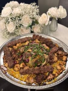 Syrian mixed grill platter with kebabs, grilled chicken, lamb and seasoned rice